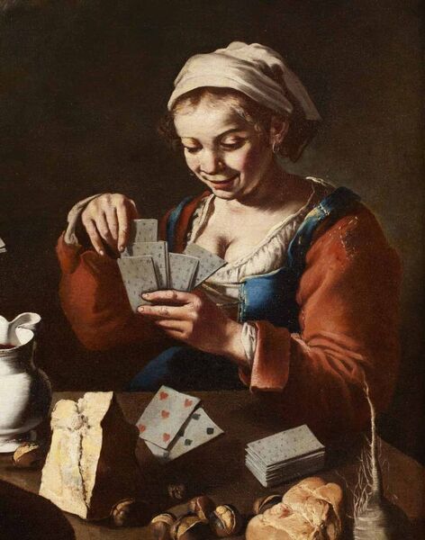 Couple jouant à un jeu de cartes